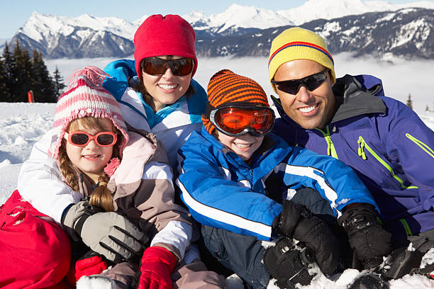 istock Family Having Fun On Ski Holiday In Mountains 178639696