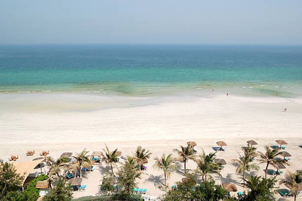 Beach and turquoise water of the luxury hotel, Ajman, UAE stock photo