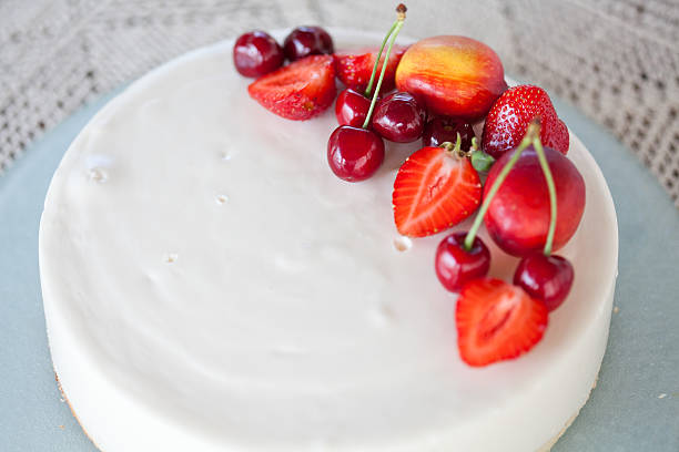 istock White Cream Icing Cake with Fruits 178640312