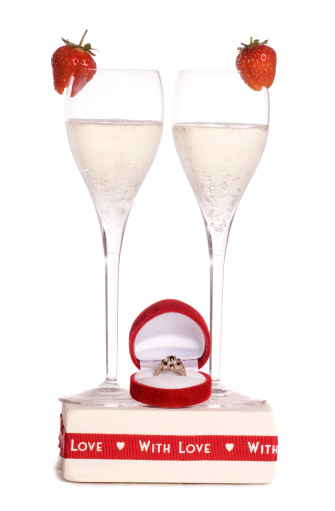 champagne with engagement ring studio cutout