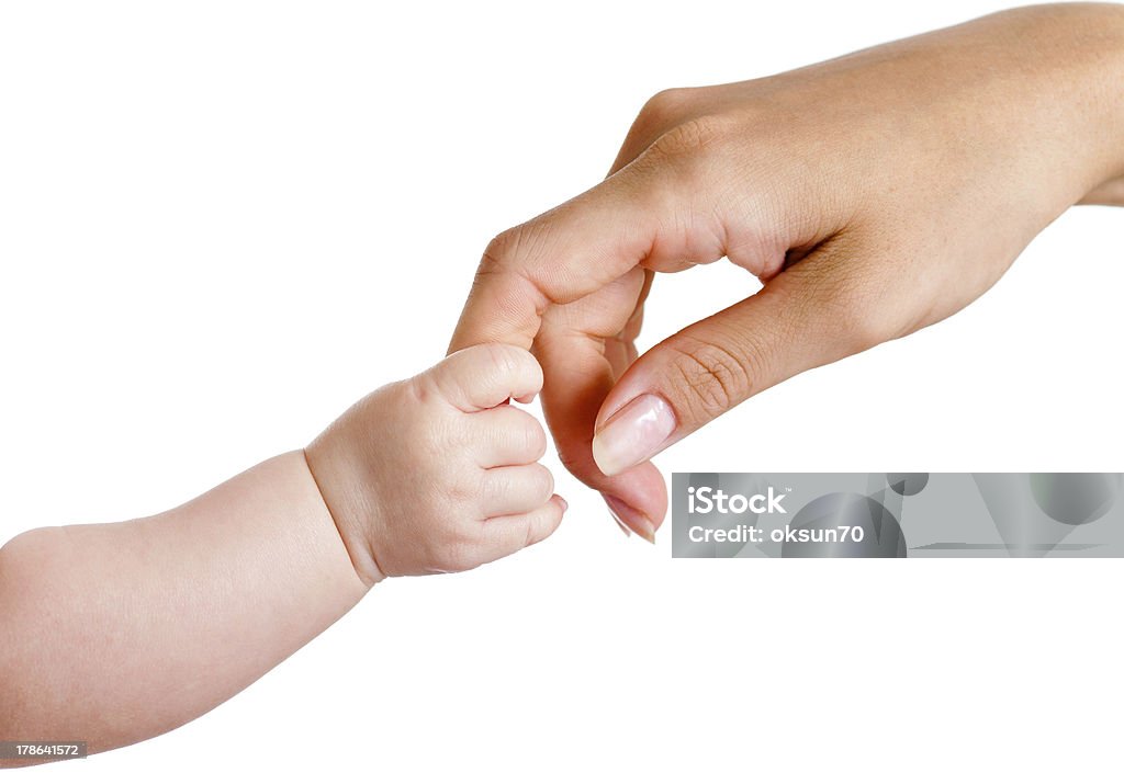 baby and mothers hands isolated on white Baby - Human Age Stock Photo