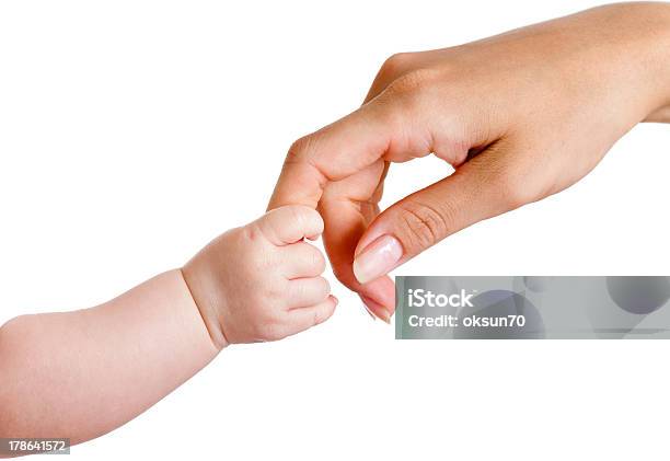 Baby And Mothers Hands Isolated On White Stock Photo - Download Image Now - Baby - Human Age, Cut Out, Mother