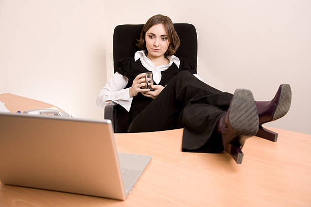 istock Young businesswoman relaxing at office 178641937