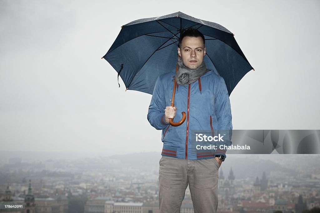 Rainy day Rainy day in Prague - young man with umbrella Adult Stock Photo