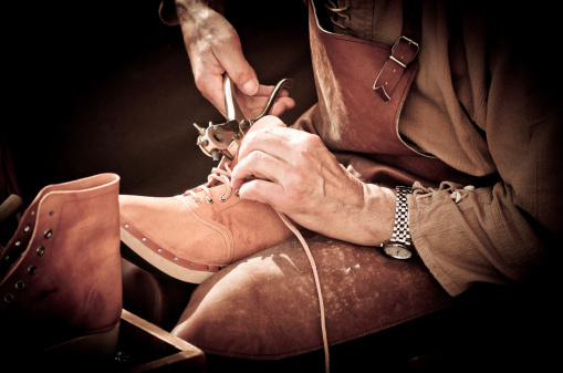 A shoemaker manufacturing boots