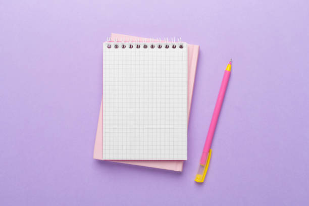 istock Notebooks with stationery on color background, top view 1786440312