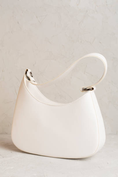 istock Trendy woman bag on color background 1786444996
