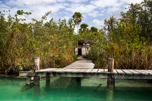 Amazing dock between beautiful Turquoise Lagoon at Yucatán Mexico
