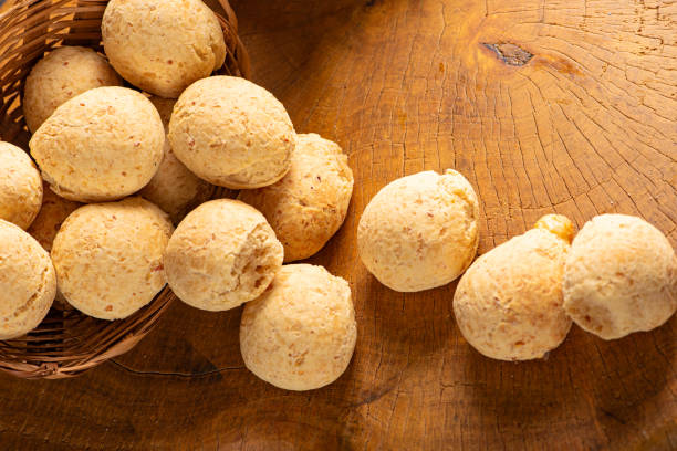 istock Cheese bread, basket with cheese bread arranged on rustic wood, dark background, selective focus. 1786453672