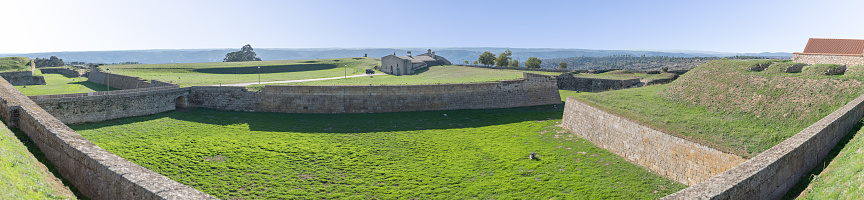 Almeida Guarda Portugal - 10 06 2023: Panoramic view at the Almeida fortress and fortification ditches, on Almeida city, Guarda, Portugal