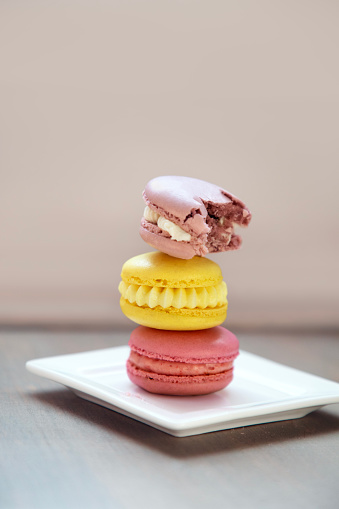 Stack of pastel macarons.