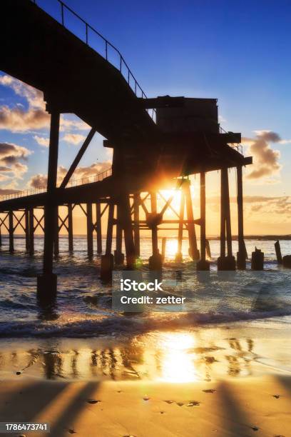 Chb Jetty Sun Beach Under Vert Stock Photo - Download Image Now - Australia, Bay of Water, Beach