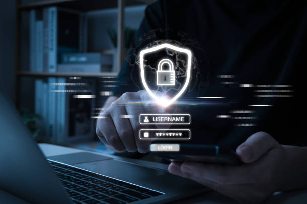 istock business man hand using mobile smart phone and laptop computer with virtual graphic cyber internet security firewall diagram, anti virus, firewall, data protection, internet network technology concept 1786489397
