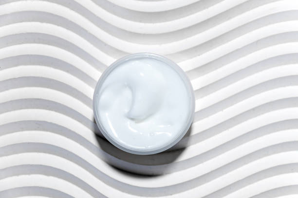 istock Moisturizing facial cream with peptides and microelements against skin aging. 1786506830