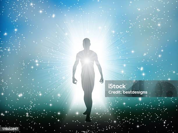 Figure Emerges From The Comos Stock Photo - Download Image Now - Light - Natural Phenomenon, The Human Body, Spirituality