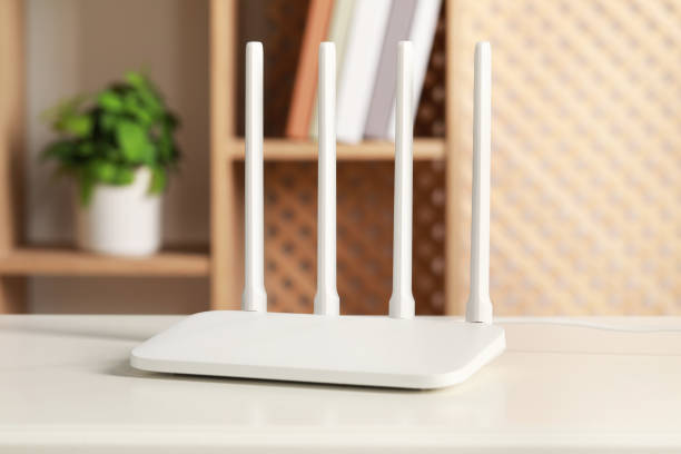 istock New Wi-Fi router on white table indoors 1786561456