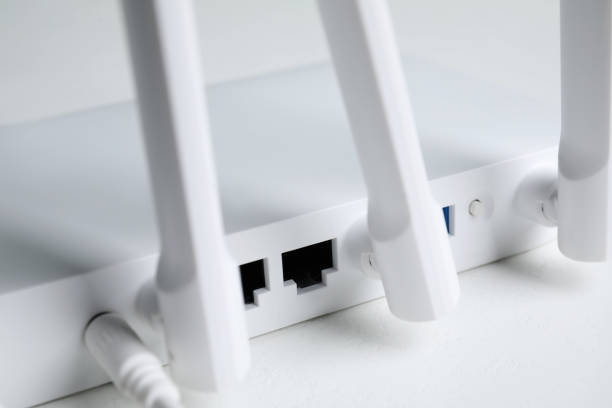 istock New modern Wi-Fi router on white table, closeup 1786561970