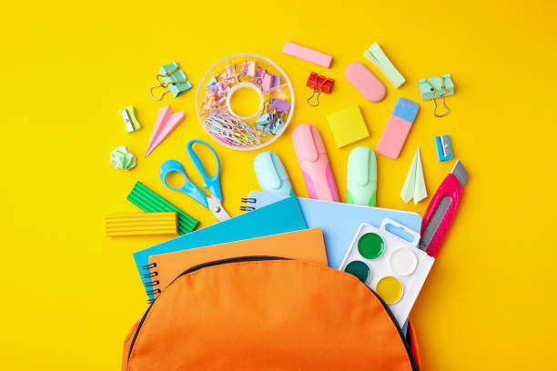 istock Flat lay composition with different school stationery on yellow background. Back to school 1786565787