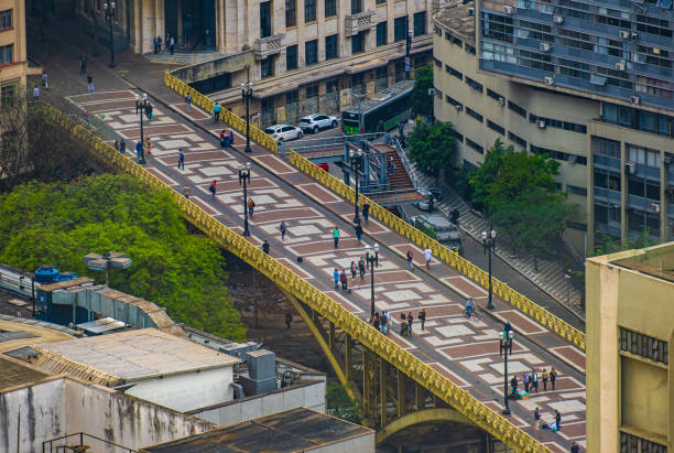 Aerial view of people crossing the Santa Ifigenia viaduct on downtown Aerial view of people crossing the Santa Ifigenia viaduct on downtown. Anhangabáu stock pictures, royalty-free photos & images