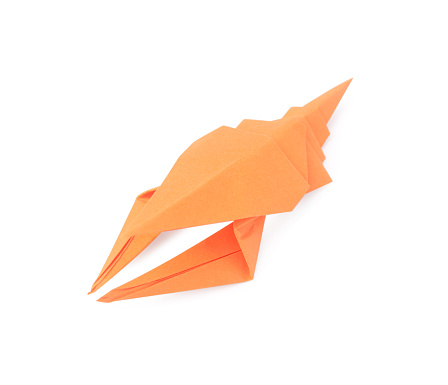 Origami art. Handmade orange paper crayfish on white background