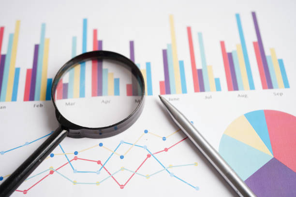istock Magnifying glass on charts graphs paper. Financial development, Banking Account, Statistics, Investment Analytic research data economy. 1786603222