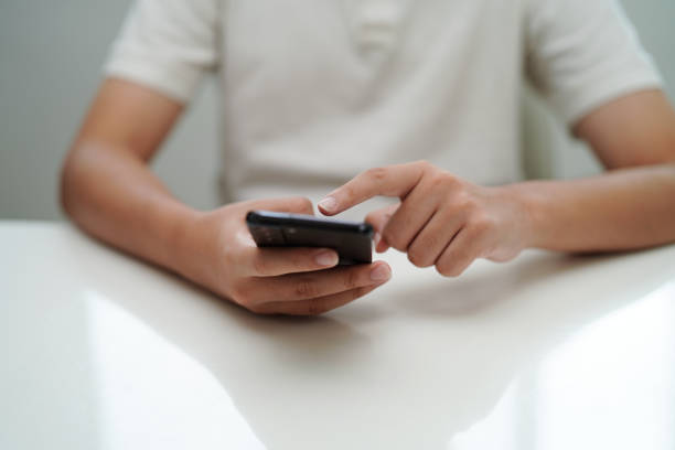 istock Teenage using smart phone for communication, search data internet website to learn. 1786604180
