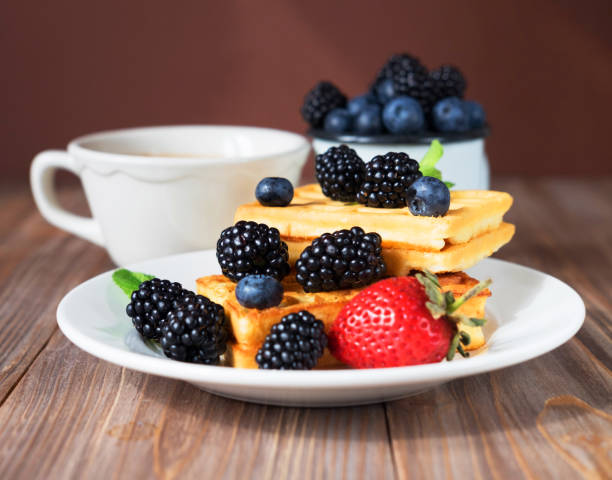 Waffles with blackberries and raspberries for breakfast