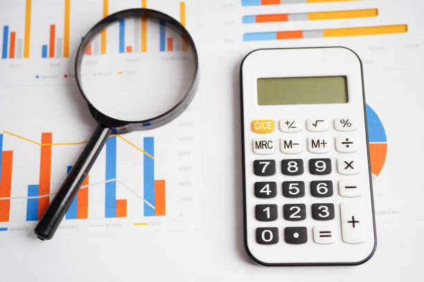 istock Magnifying glass on charts graphs paper. Financial development, Banking Account, Statistics, Investment Analytic research data economy. 1786607365
