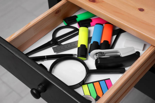istock Office supplies in open desk drawer indoors, closeup 1786620542