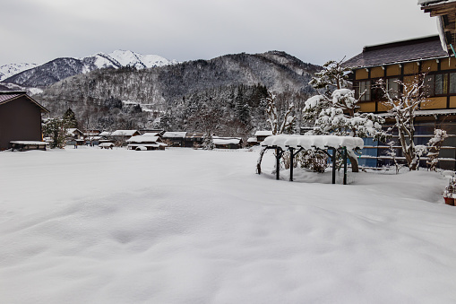 The dense snow covering the traditional Gassho-style House and paddy field worthy a lifetime visit. The Shirakawa-go (Shirakawa Village) is one of the World Heritage Site, in the Gifu Prefecture, Japan.