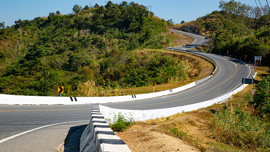 Curve road three number shape way for transportation in Thailand.