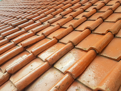 the roof of house made with rooftile.brown clay tile texture, rooftile texture