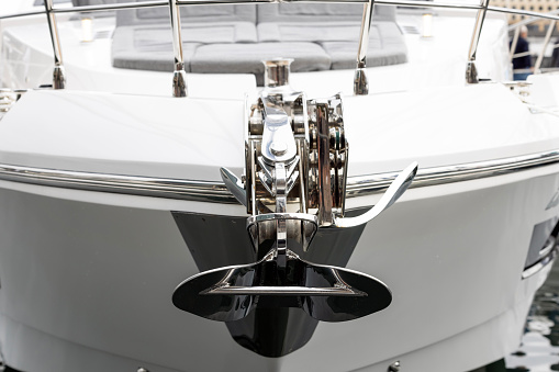 Luxury motorboat Anchor, front view, background with copy space, full frame horizontal composition