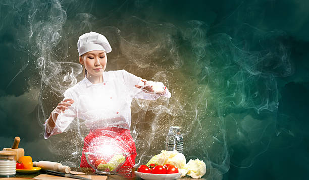 istock Asian female cooking with magic 178703454
