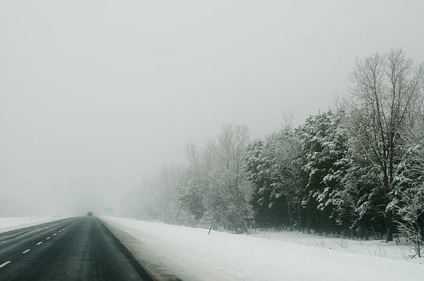 istock Winter, Snowstorm, Road, Forest, Winter, Snow-Storm, Highway, Trees 178703663