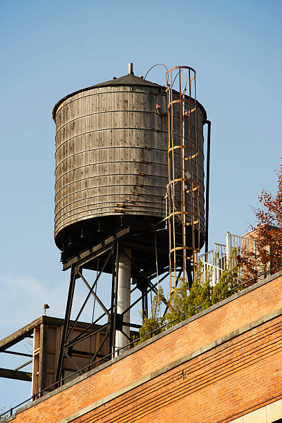 istock Typical rooftop water tank and staircase in New York 178703907