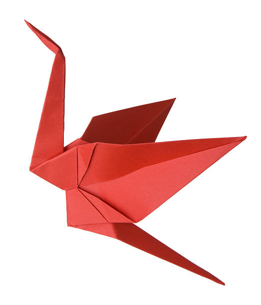 Origami Crane "Red origami crane, traditional Japanese art of paper folding." origami cranes stock pictures, royalty-free photos & images
