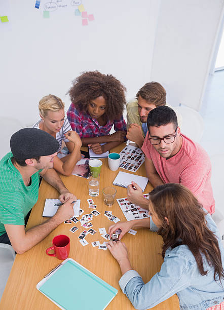 istock Editors choosing photographs in a meeting 178704786