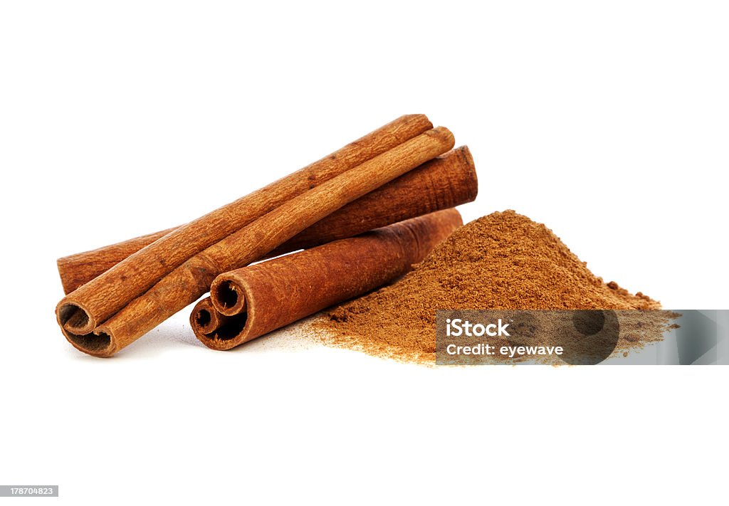 Cinnamon Cinnamon sticks and powder on white background Cinnamon Stock Photo