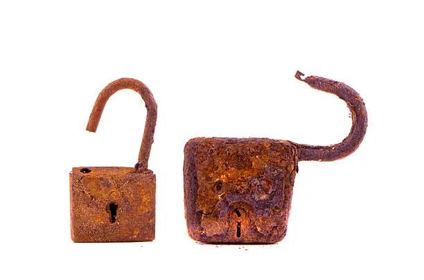 two aged rusty locks isolated on white background