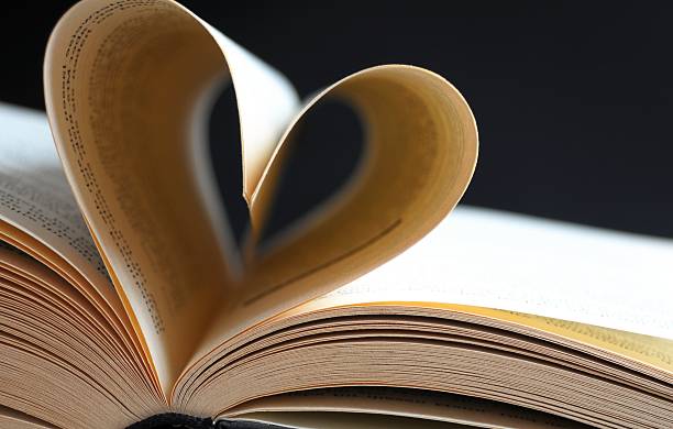 istock pages of a book curved into heart 178707530