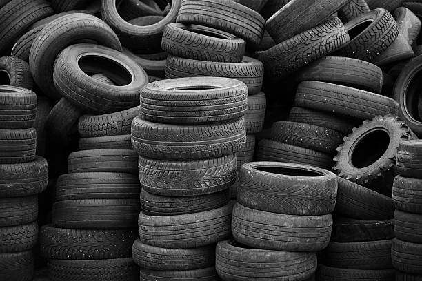 istock Old used tires stacked with high piles 178707631