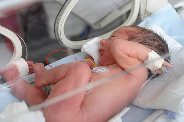istock Newborn baby in incubator 178707810