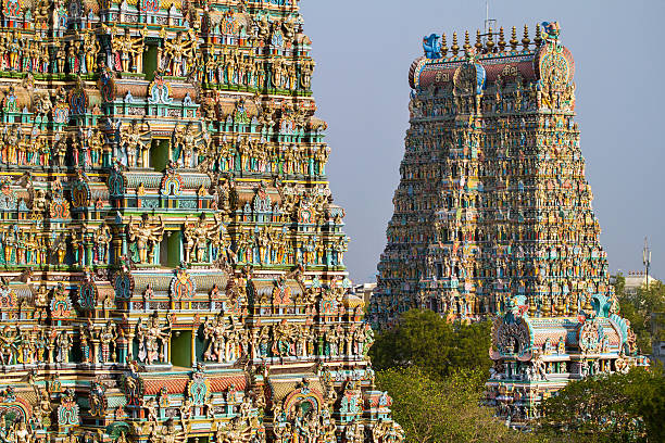Meenakshi temple in Madurai MADURAI, INDIA - MARCH 3: Meenakshi temple - one of the biggest and oldest Indian temples on March 3, 2013 in Madurai, Tamil Nadu, India. The 14 gateway towers called gopura ranging from 45 to 50m. culture of india photos stock pictures, royalty-free photos & images