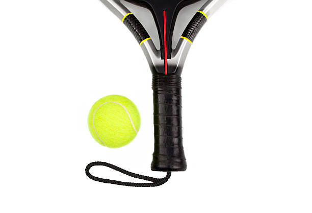 Racket and ball Paddle racket and ball isolated in white background. paddle ball stock pictures, royalty-free photos & images