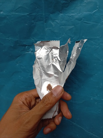 the packaging foil has been opened, tin foil, metal leaves