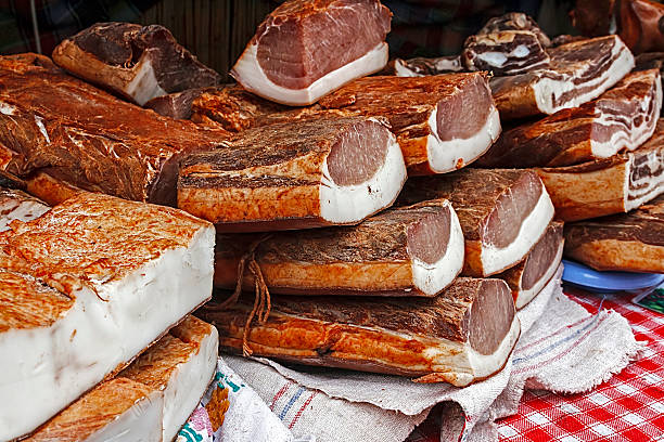 istock Pieces of smoked pork bacon and ham overlapping 178710202