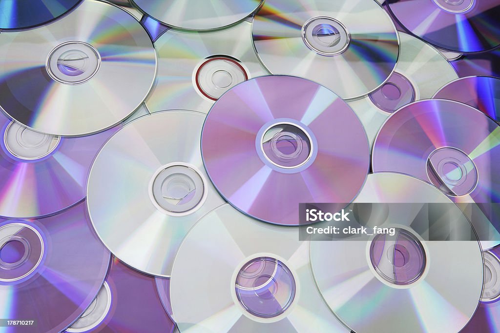 Lots of colorful discs for technological background use Audio Equipment Stock Photo