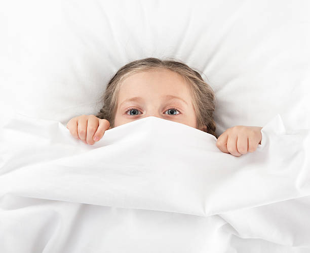 istock cheerful girl in bed 178710317