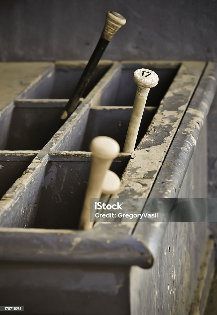 The Tool Box Bats located in a bat box in a dugout. Baseball Bat Stock Photo